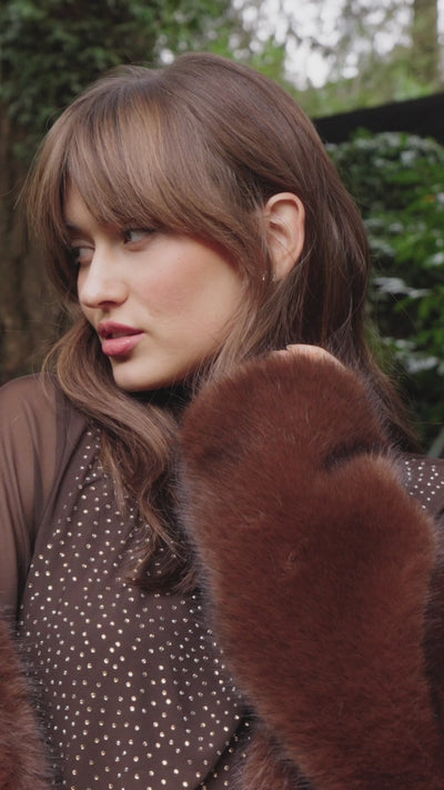 Manteau en fausse fourrure